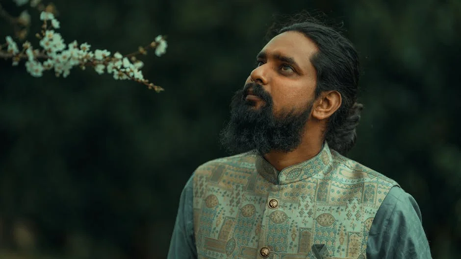 Aadhav Arjuna Sparks Debate with Remarks on Rajinikanth — Market Implications Explored — Economy Business